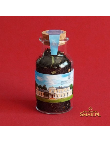 Szklany flakonik z herbatą i korkiem