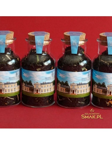 Szklany flakonik z herbatą i korkiem