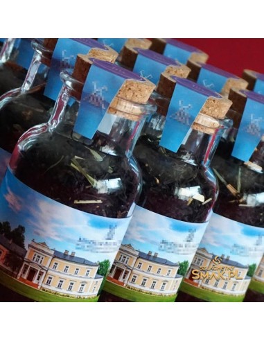 Szklany flakonik z herbatą i korkiem