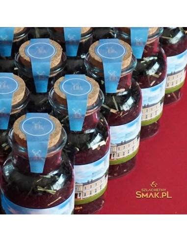 Szklany flakonik z herbatą i korkiem